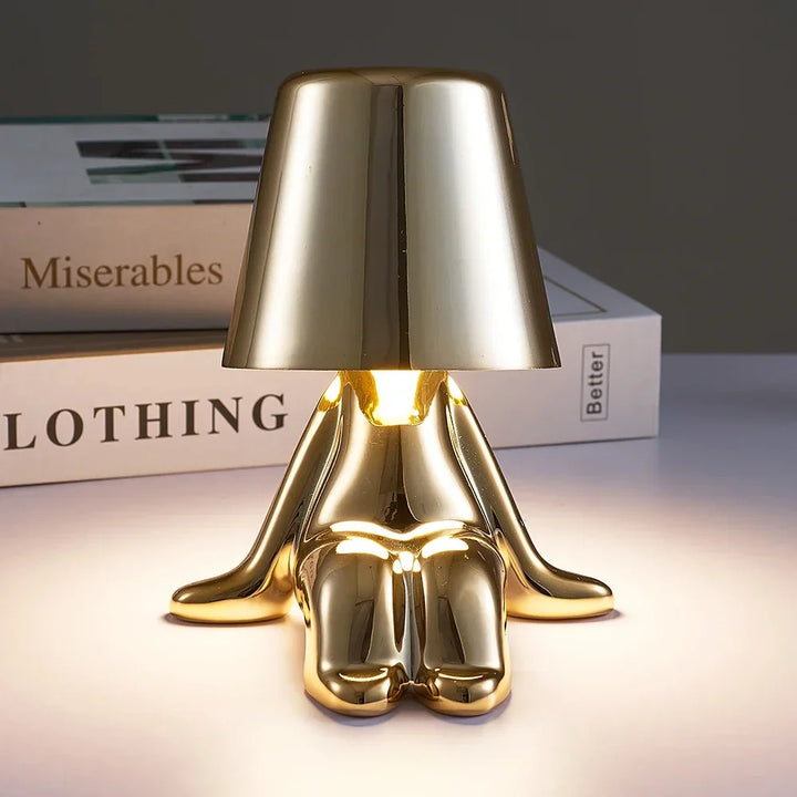 Bezprzewodowa lampka nocna LED z postacią człowieka w metalicznym połysku