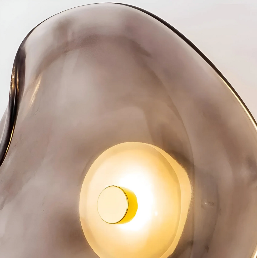 Dekoracyjna lampa ścienna z falistą tarczą