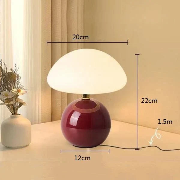 Lampa stołowa LED z płaskim opalowym kloszem kopułowym na kulistej podstawie
