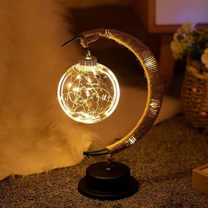 Lampa stołowa LED z podświetlaną kulą i ramką w kształcie półksiężyca