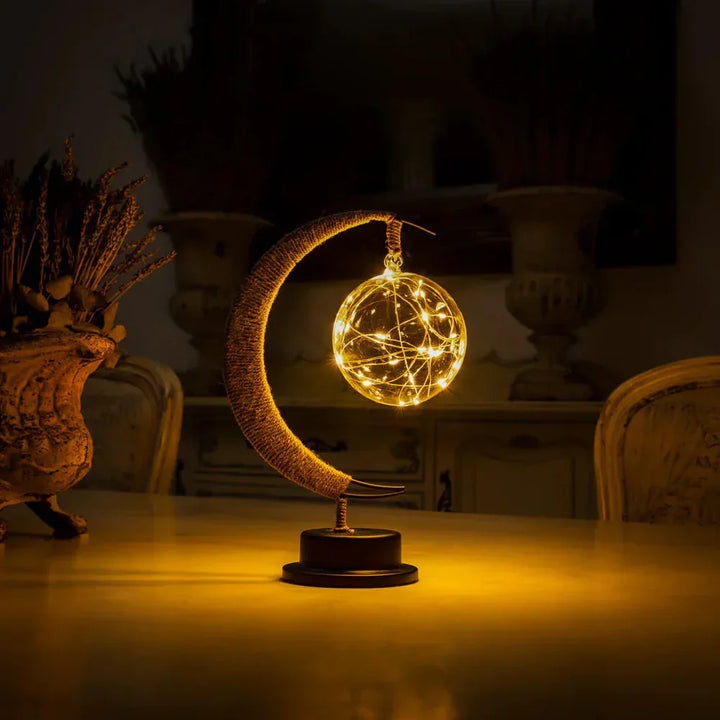Lampa stołowa LED z podświetlaną kulą i ramką w kształcie półksiężyca