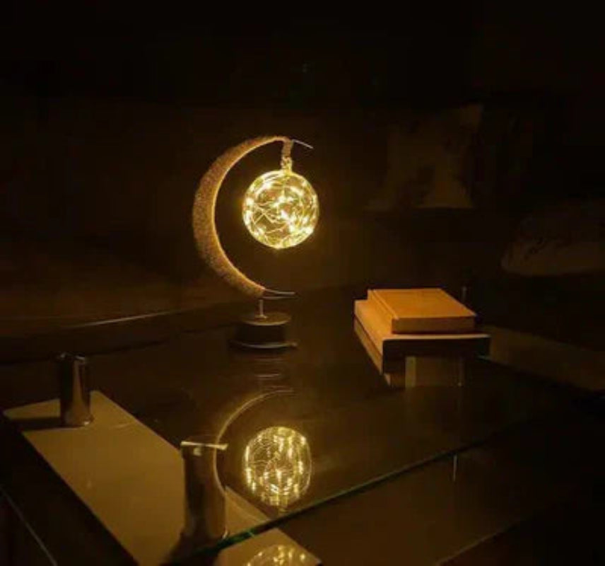 Lampa stołowa LED z podświetlaną kulą i ramką w kształcie półksiężyca
