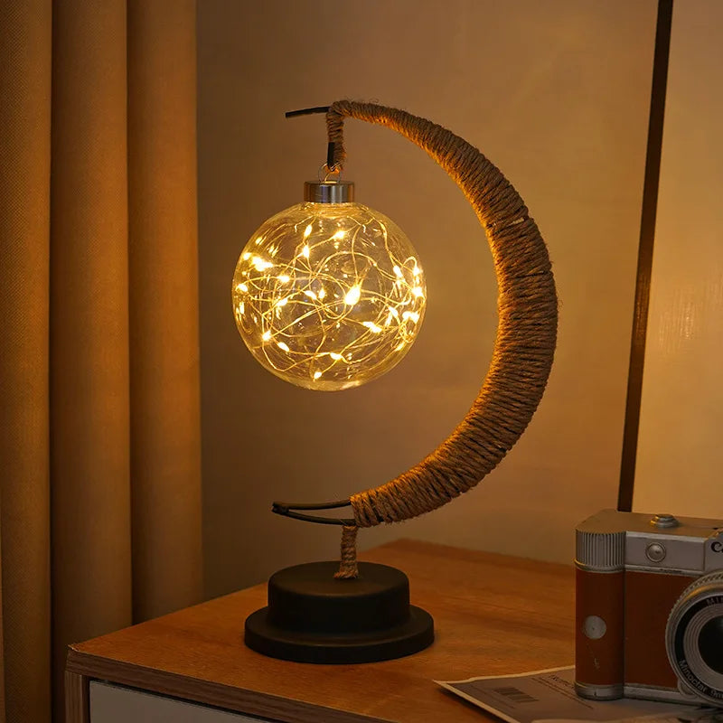 Lampa stołowa LED z podświetlaną kulą i ramką w kształcie półksiężyca