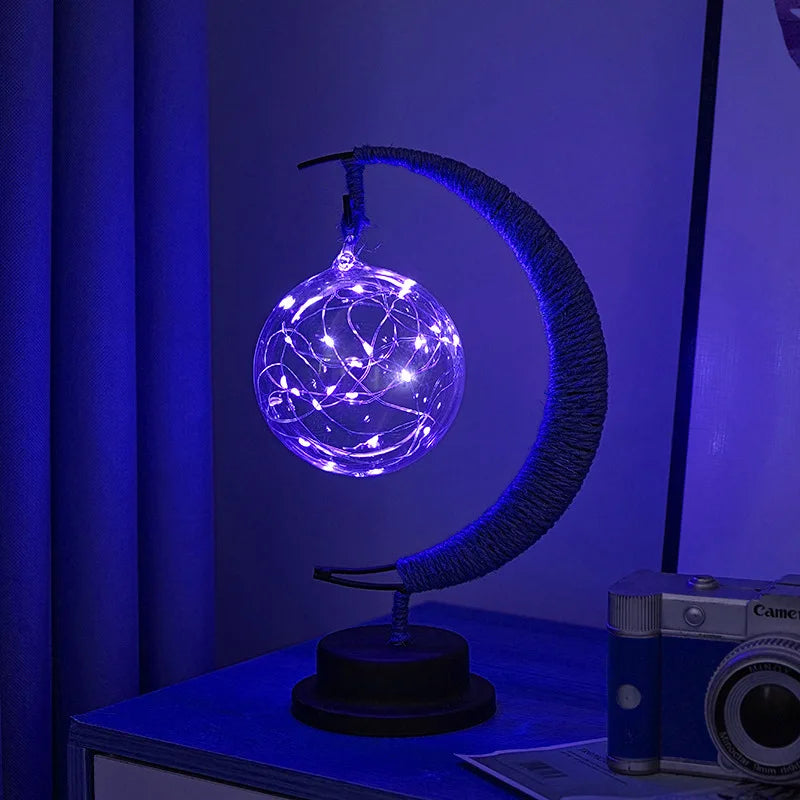 Lampa stołowa LED z podświetlaną kulą i ramką w kształcie półksiężyca
