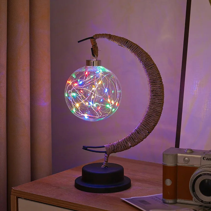 Lampa stołowa LED z podświetlaną kulą i ramką w kształcie półksiężyca
