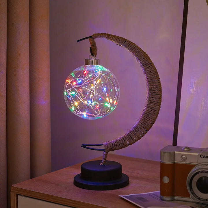 Lampa stołowa LED z podświetlaną kulą i ramką w kształcie półksiężyca