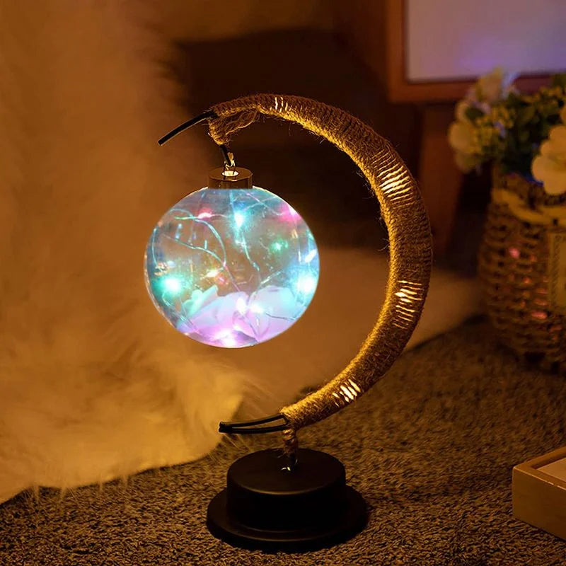 Lampa stołowa LED z podświetlaną kulą i ramką w kształcie półksiężyca