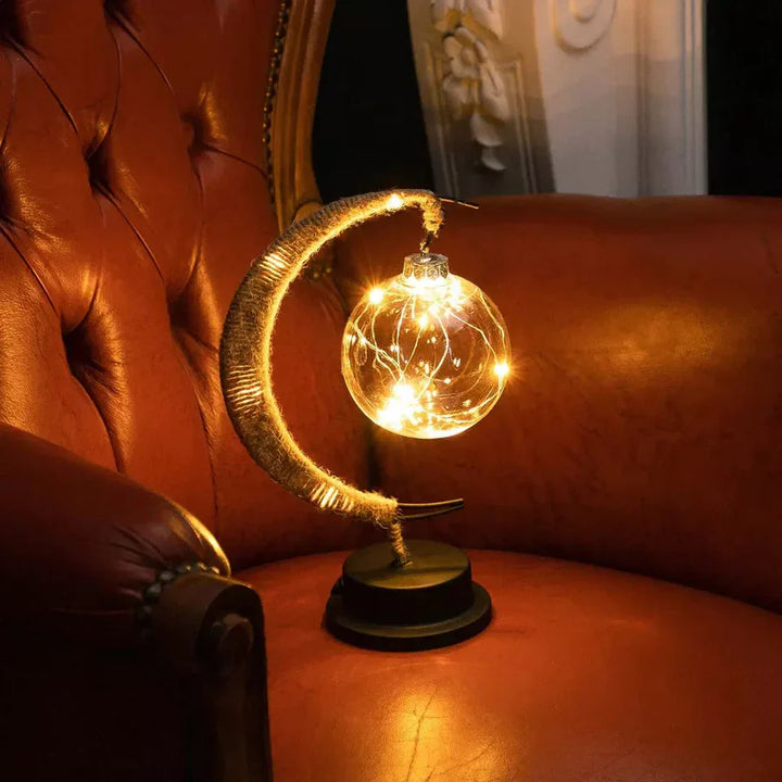 Lampa stołowa LED z podświetlaną kulą i ramką w kształcie półksiężyca