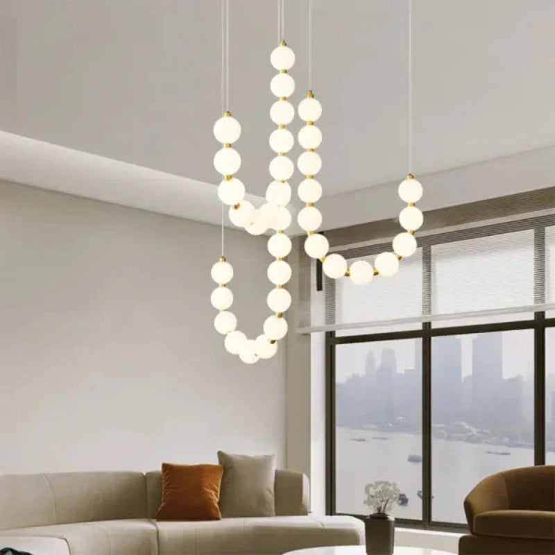 Lampa wisząca LED z kaskadowymi sznurami szklanych kul w stylu naszyjnika