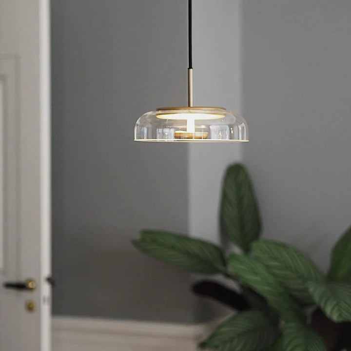 Lampa wisząca LED z płaskim szklanym kloszem przezroczysta kopuła na mosiężnym trzpieniu