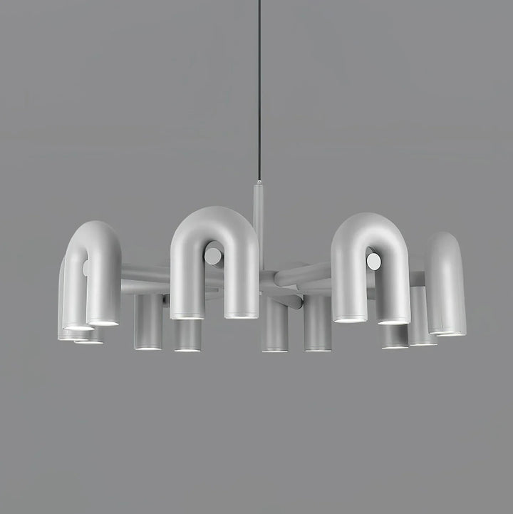 Lampa wisząca z cylindrycznymi punktami świetlnymi na łukowatych ramionach