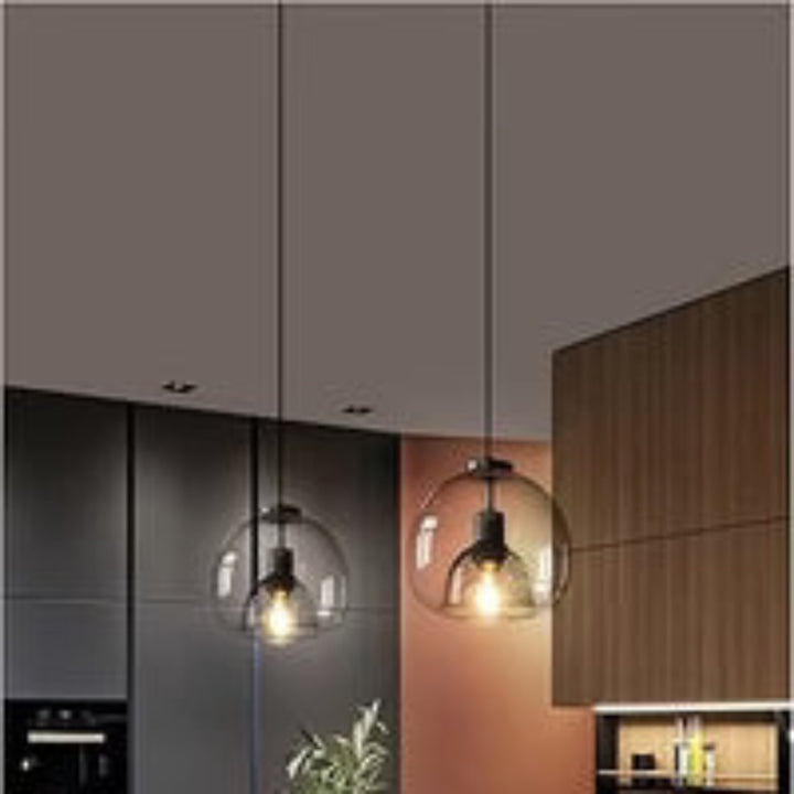 Lampa wisząca z podwójnym szklanym kloszem i żarówką Edisona