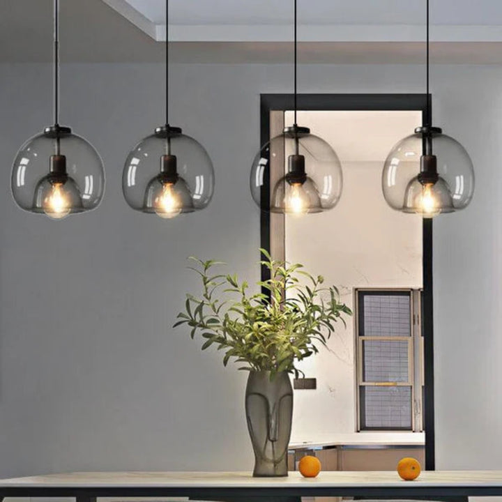 Lampa wisząca z podwójnym szklanym kloszem i żarówką Edisona