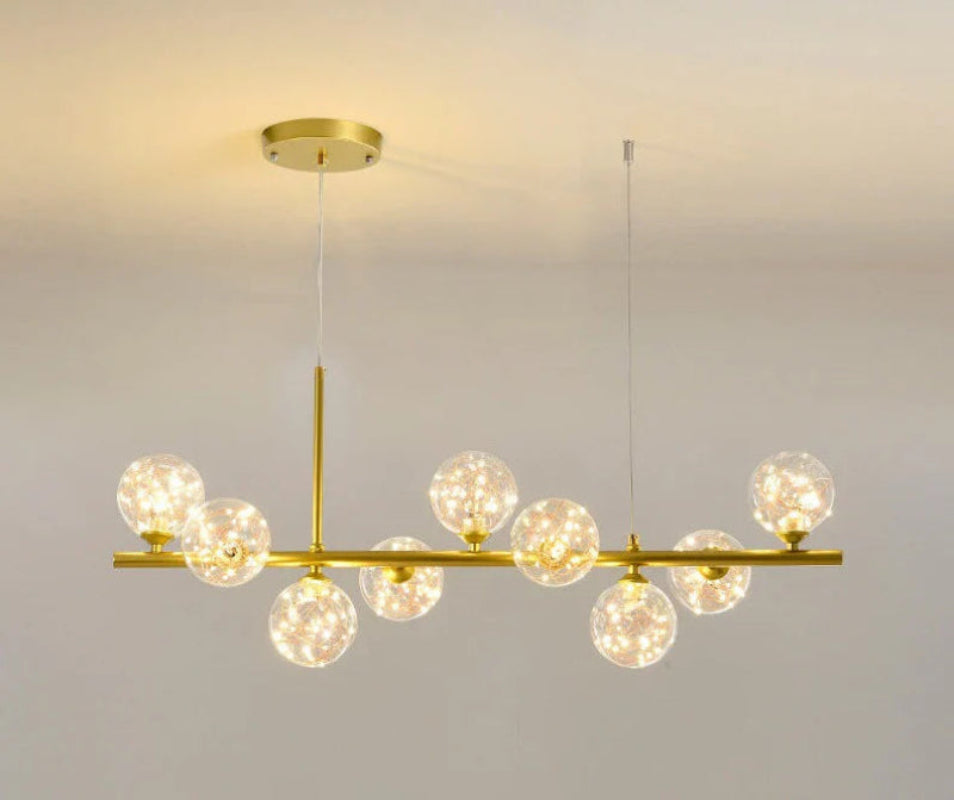 Lampa wisząca z poziomym ramieniem i kulistymi szklanymi kloszami
