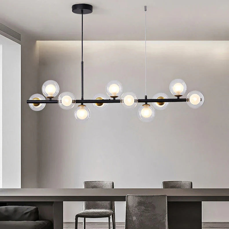 Lampa wisząca z poziomym ramieniem i kulistymi szklanymi kloszami