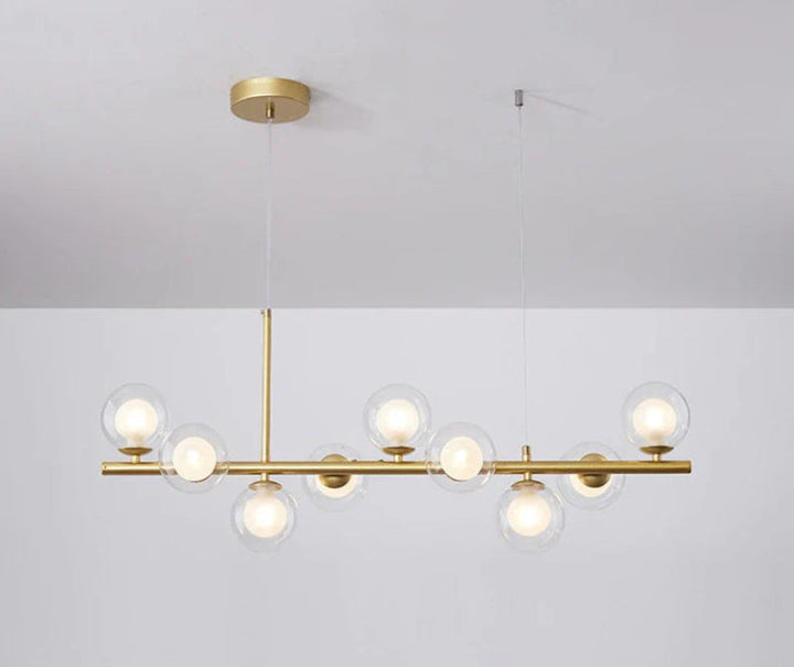 Lampa wisząca z poziomym ramieniem i kulistymi szklanymi kloszami