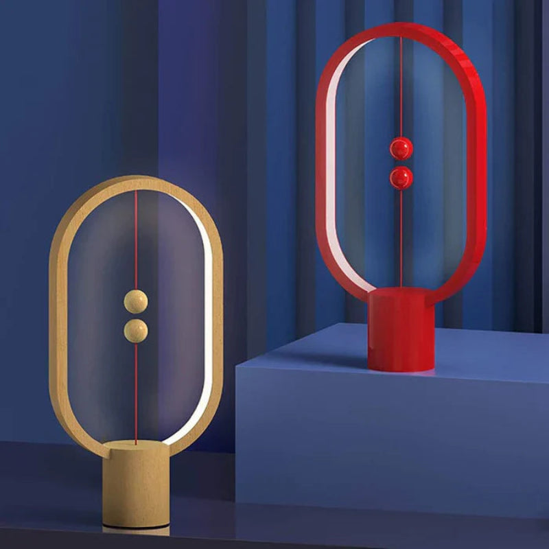 Lampka LED z magnetycznym wyłącznikiem owalna ramka z lewitującymi kulkami