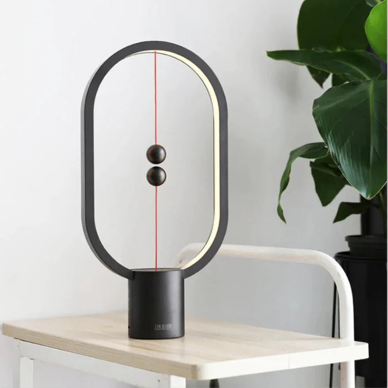 Lampka LED z magnetycznym wyłącznikiem owalna ramka z lewitującymi kulkami