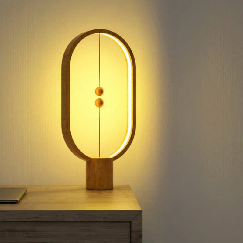 Lampka LED z magnetycznym wyłącznikiem owalna ramka z lewitującymi kulkami